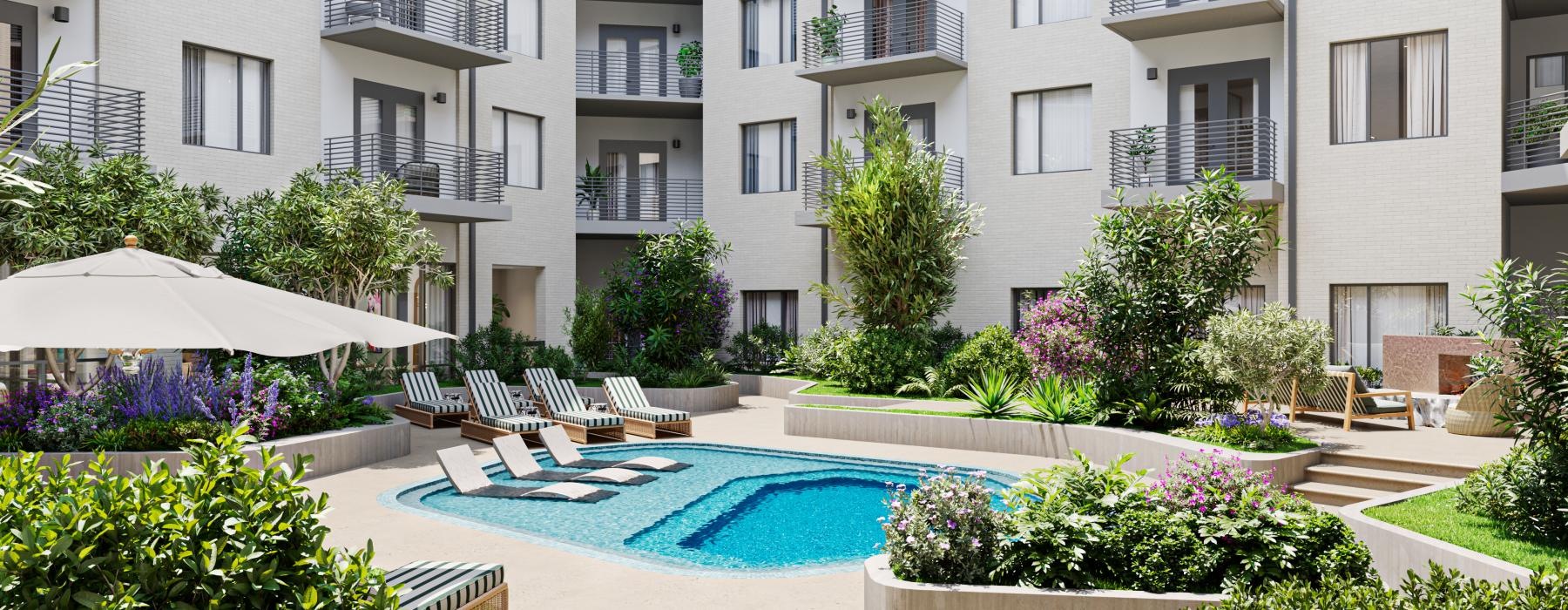 a pool in a courtyard between buildings