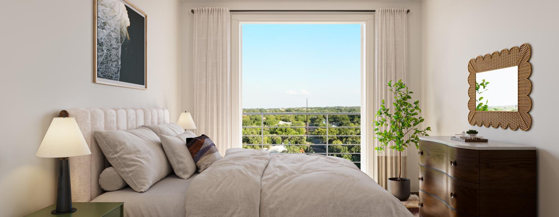 a bedroom with a large window